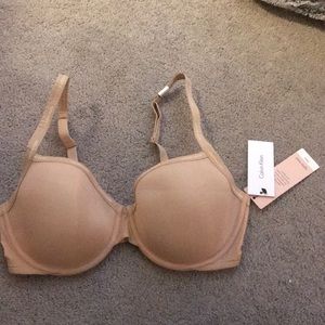 calvin klein lightly lined demi bra in nude